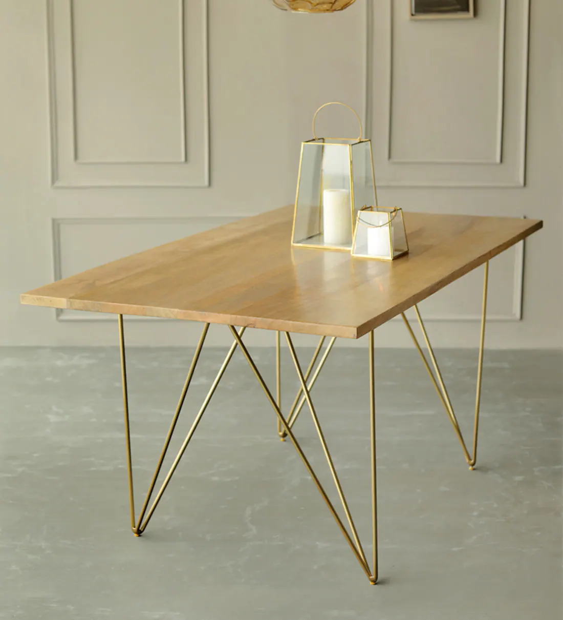 https://manzilcart.in/public/assets/images/products/Art-Deco-Solid-Wood-4-Seater-Dining-Table-in-Natural-Finish1743601070.jpg
