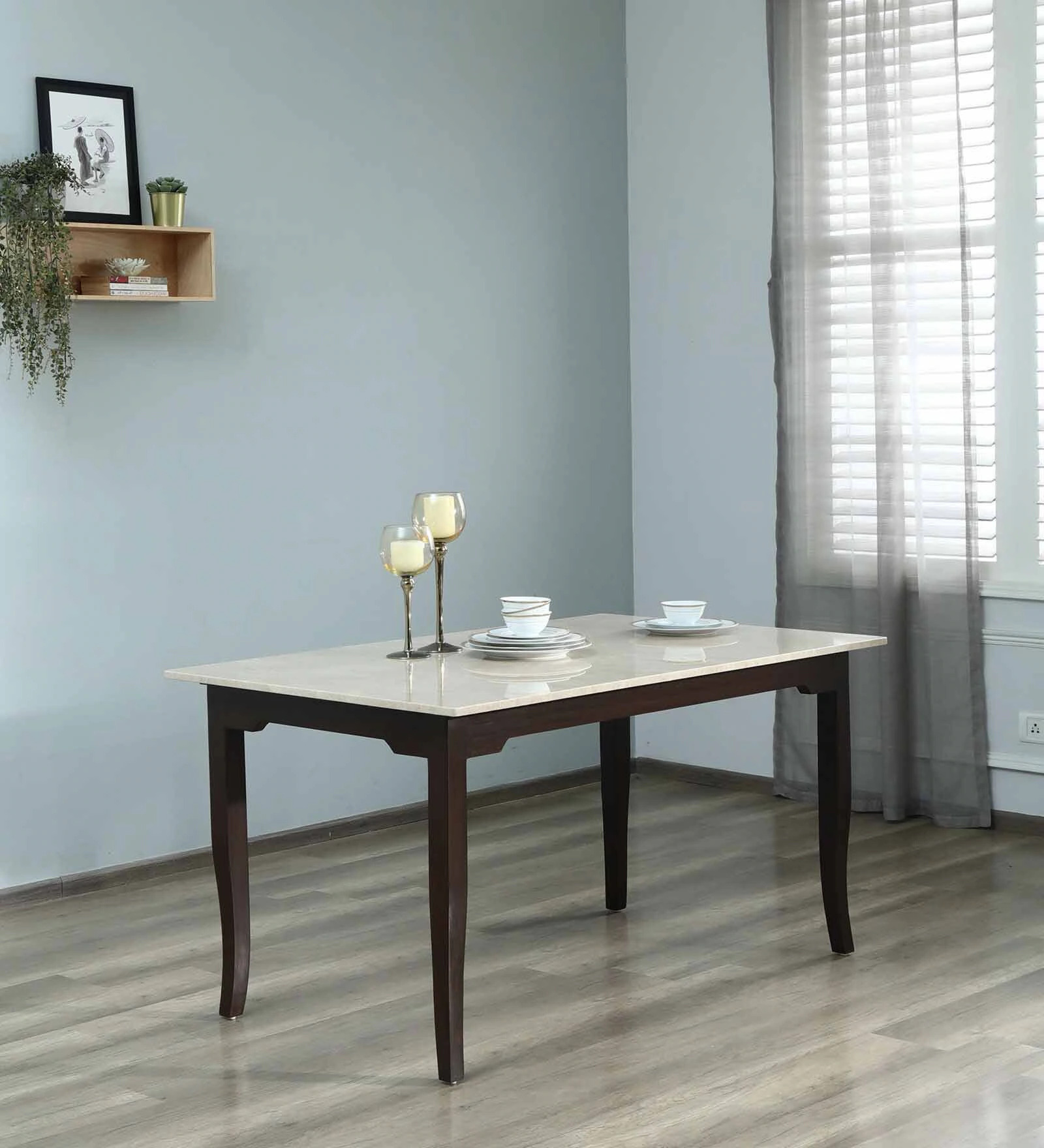 https://manzilcart.in/public/assets/images/products/Plinto-Marble-Top-6-Seater-Dining-Table-in-Beige-Finish1743600936.jpg